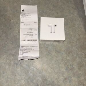 Apple AirPods with Charging Case in White